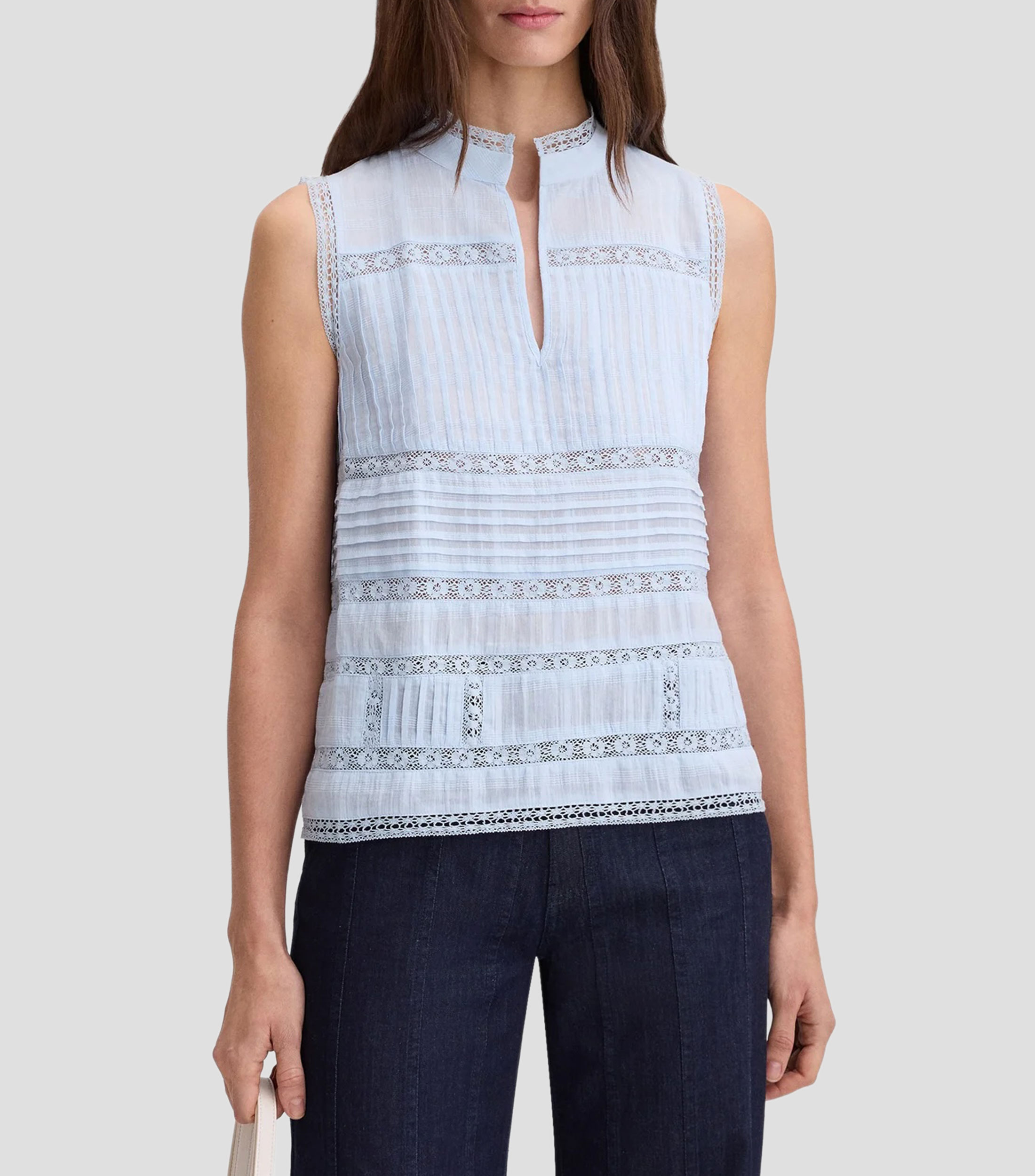 Blusa lisa sin mangas Mujer